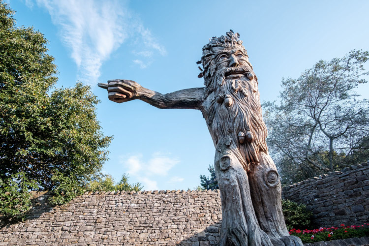 Statue of magical creature giving directions.